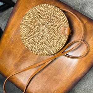 Tan Woven Crossbody Bag with Circular Design